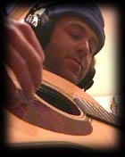 Guitarist, vocalist and composer, Dan Sheridan during his recording session